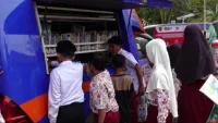 Perpustakaan Keliling Dispersip Tabalong Hadir di Desa Salikung, Anak-anak Antusias Membaca