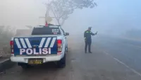 Antisipasi Risiko Kecelakaan Akibat Kabut Asap, Sat Lantas Polres Tanah Laut Intensifkan Patroli Jalan Raya