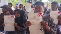 Masyarakat Berpenghasilan Rendah Penerima Sertifikat Tanah di Banjar Diingatkan Jangan Mudah Gadaikan Aset