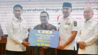 Bupati Tanah Laut Terima Sertifikat Aset BMD dan Program LSDP dari Pemerintah Pusat di Banjarbaru