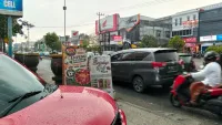 Hujan di Batas Kota Banjarbaru-Martapura, Pedagang Kue Bersyukur Kabut Asap Bisa Berkurang