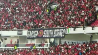 Spanduk Suporter Kalsel Terbentang di SUGBK Sambut Timnas Indonesia Juara FIFA ASEAN Cup 2026