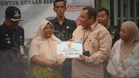 Pemkab HST Salurkan Bantuan untuk Warga Korban Kebakaran di Mahang Sungai Hanyar