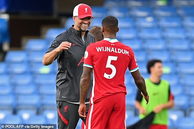 Jurgen Klopp dan Gerogino Wijlandum. (getty images)