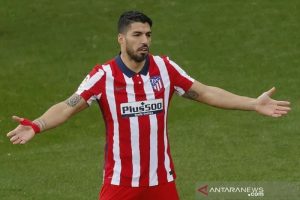 Ekspresi penyerang Atletico Madrid Luis Suarez saat tampil dalam lanjutan Liga Spanyol melawan Cadiz di Stadion Ramon de Carranza, Cadiz, Spanyol, Minggu (31/1/2021) waktu setempat. (ANTARA/REUTERS/Jon Nazca)