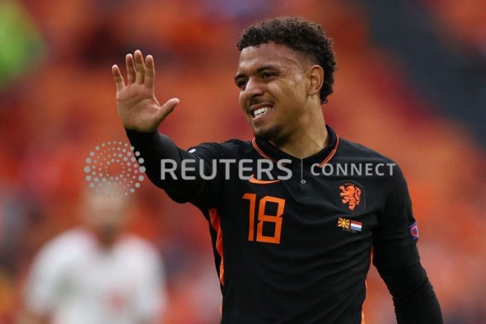 Pemain Belanda Donyell Malen dalam pertandingan Belanda melawan Makedonia Utara. (reuters via antara)