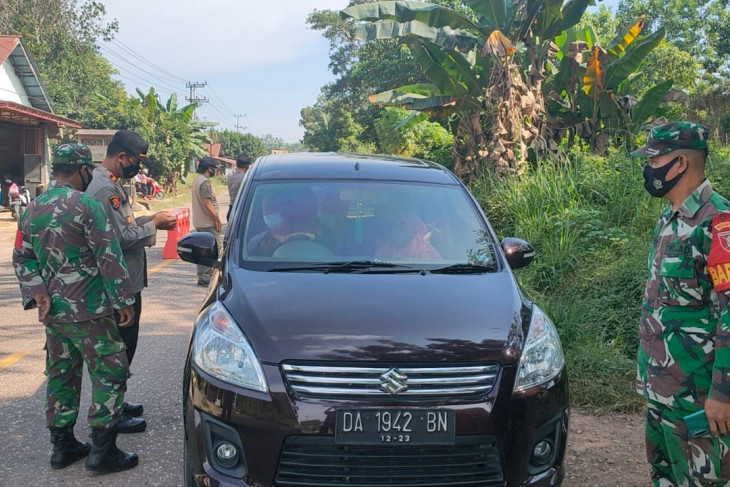 Antisipasi Lonjakan Kasus COVID-19, Petugas Gabungan Lakukan Penjagaan dan Pemeriksaan di Perbatasan Tabalong-Kalteng