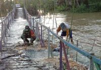 Curah Hujan Tinggi, Babinsa Koramil Batulicin Ingatkan Warga Waspada