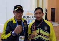 Bain Persembahkan Medali Emas untuk Istri dan Anak
