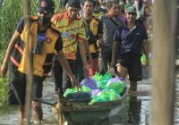 Banjir Melanda 5 Kecamatan di HSU, Relawan Gabungan Berjibaku Salurkan Bantuan