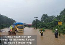 Air Sungai Nibung Meluap, Polsek Angsana Imbau Pengendara Batulicin - Banjarmasin Waspada
