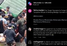VIRAL, Warga Berebut Minyak Goreng Gratis saat Truk Pengangkut Terperosok ke Sungai