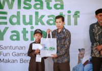Laznas LMI Kalsel dan Pegadaian Syariah Banjarmasin Bikin Gembira Puluhan Anak Yatim