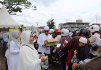 Dispar Kalsel Bagikan 2.000 Paket Makanan Gratis untuk Jemaah Haul Abah Guru Sekumpul