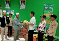 Dinas Sosial Tanah Bumbu Salurkan Puluhan Paket Sembako Kepada Warga Terdampak Banjir di Kusan Hulu