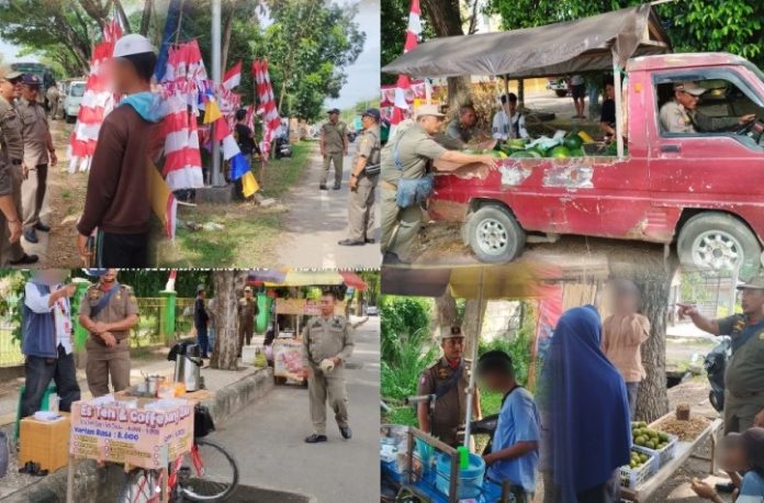 Tim Opsdal Satpol PP Kota Banjarbaru menegur PKL yang berdagang di tempat yang dilarang. (wartabanjar.com - Ist. Satpol PP Bjb)