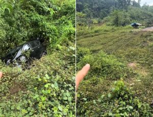 Mobil terperosok di jurang jalan alternatif Banjarbaru-Batulicin. (wartabanjar.com - Ist. Kiriman warga via @banjarkju)