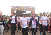 Kapolres Tabalong Ingatkan Partisipasi Aktif di TPS Kepada Peserta Fun Walk