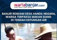 VIDEO- Banjir Rendam Desa Handil Negara, Warga Terpaksa Makan Siang di Tengah Kepungan Air