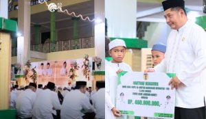 Bupati HST, Samsul Rizal menyerahkan secara simbolis bantuan beasiswa kepada perwakilan hafidz. (wartabanjar.com - Ist. MC HST)