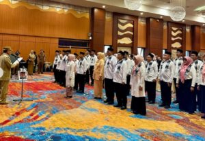 ubernur H Muhidin mengukuhkan Pembina Posyandu dan melantik Pengurus Tim Pembina Posyandu Kalsel. (wartabanjar.com - Ist. IG Dinas PUPR Kalsel)