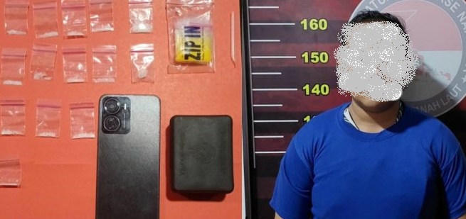 24042025_Tersangka MR dan barang bukti yang diamankan Satresnakorba Polres Tanah Laut. (wartabanjar.com - Ist. Humas) Tersangka MR dan barang bukti yang diamankan Satresnakorba Polres Tanah Laut. (wartabanjar.com - Ist. Humas)
