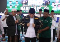 Bupati Andi Rudi Latif Pimpin Apel Harlah ke 91 Gerakan Pemuda Ansor Tanah Bumbu: Soroti Peran Penting GP Ansor