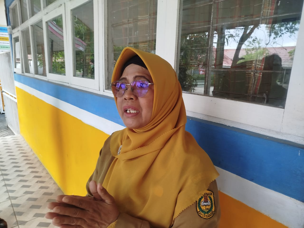 Kepala Sekolah SMPN 33 Banjarmasin, Hj. Sumiyati