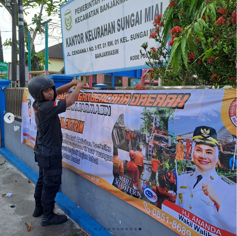 Waspadai Banjir Rob dan Hujan Ekstrem, BPBD Kota Banjarmasin Pasang Spanduk Peringatan di Sejumlah Titik