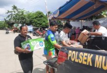 Meriahkan Momen 5 Rajab, Kapolsek Murung Pudak Turut Berbagi ke Jemaah Haul Guru Sekumpul 2025