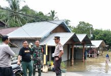 Banjir di Awayan–Tebing Tinggi Rendam 138 Rumah, Kapolsek Awayan Turun ke Lapangan