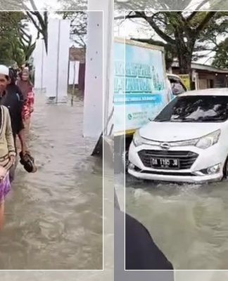 Jalur Alternatif Menuju Haul Guru Sekumpul Terendam Banjir, Jemaah Terobos Genangan di Jalan Veteran Martapura