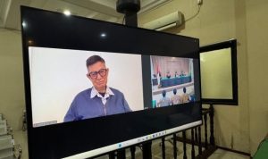 Syachran Eric Lenyoq saat mengikuti sidang di PN Samarinda