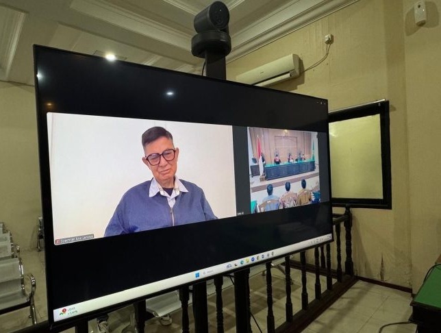 Syachran Eric Lenyoq saat mengikuti sidang di PN Samarinda